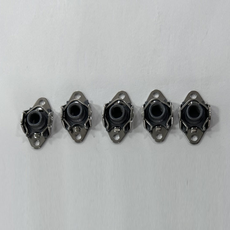 Qu'est-ce qu'une double oreille à double noix d'ancrage flottante auto-verrouillable?